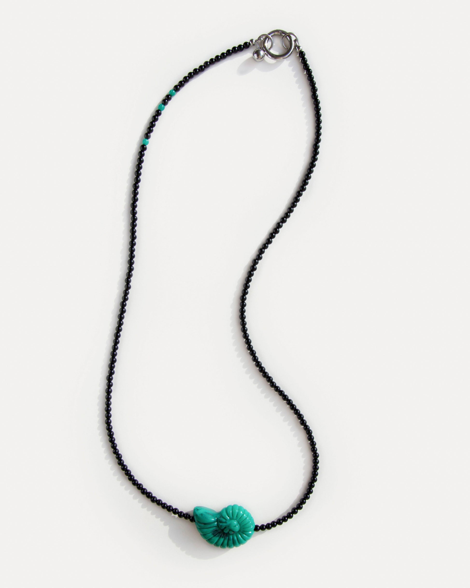 Long beaded necklace with black agate, amazonite, and sculptural green shell pendant – Emerald Shell Necklace by Jewell Reef