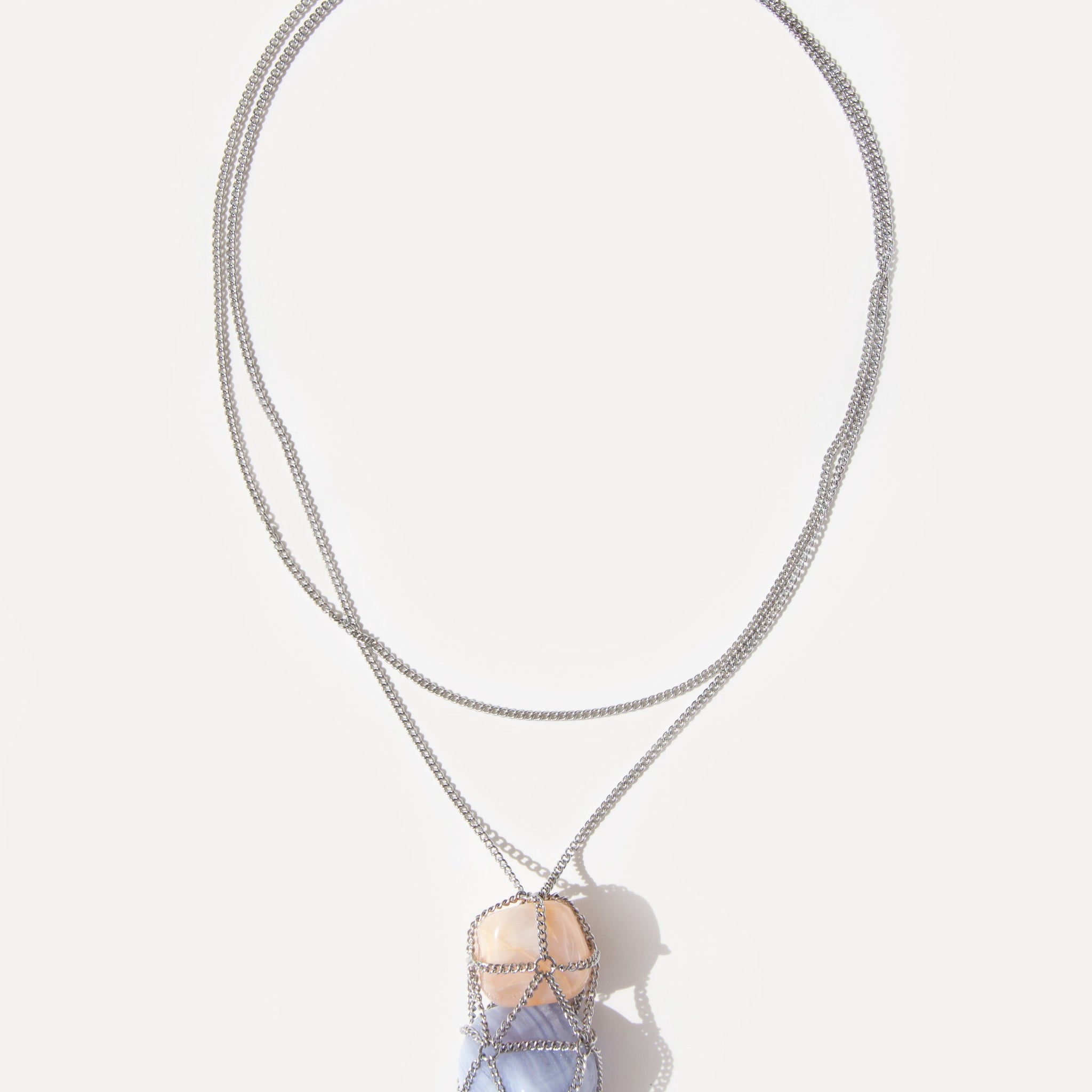 Angel Skin Necklace with sunstone and blue lace agate wrapped in a delicate stainless steel net
