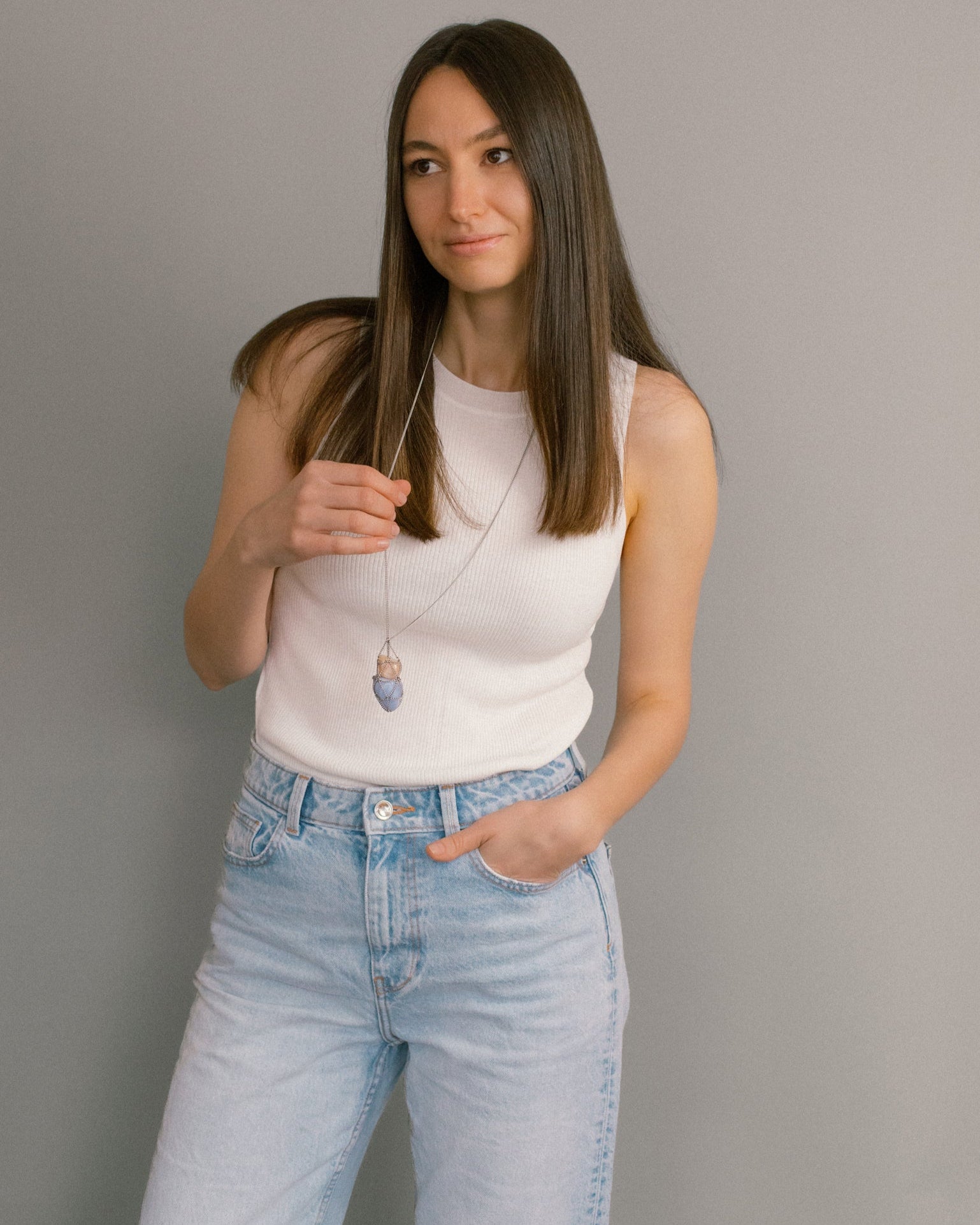 Angel Skin Necklace worn with casual denim and white tank top, minimalist and expressive