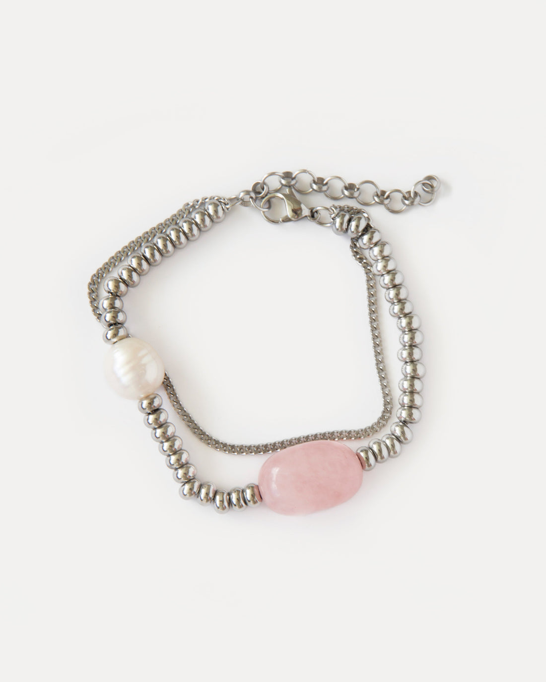 Candy Bracelet with rose quartz, freshwater pearl, and polished stainless steel beads — a minimalist silver-tone design with soft pink accents.