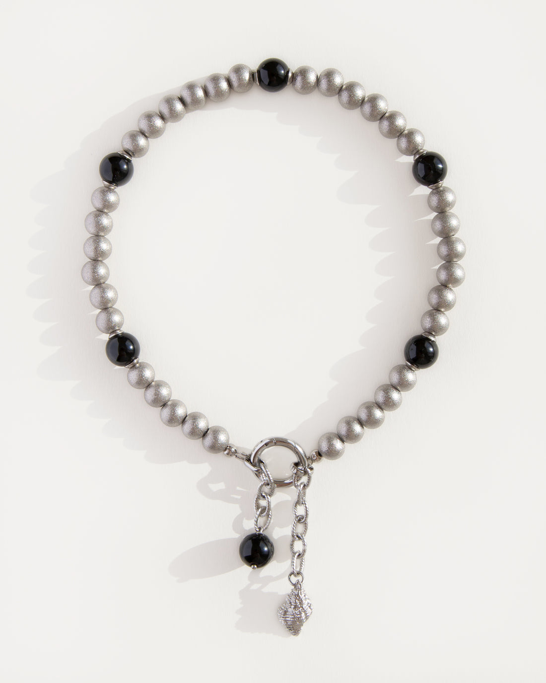 Black agate and stainless steel beaded choker necklace with front ring clasp and drop charm, modern minimalist natural stone jewelry