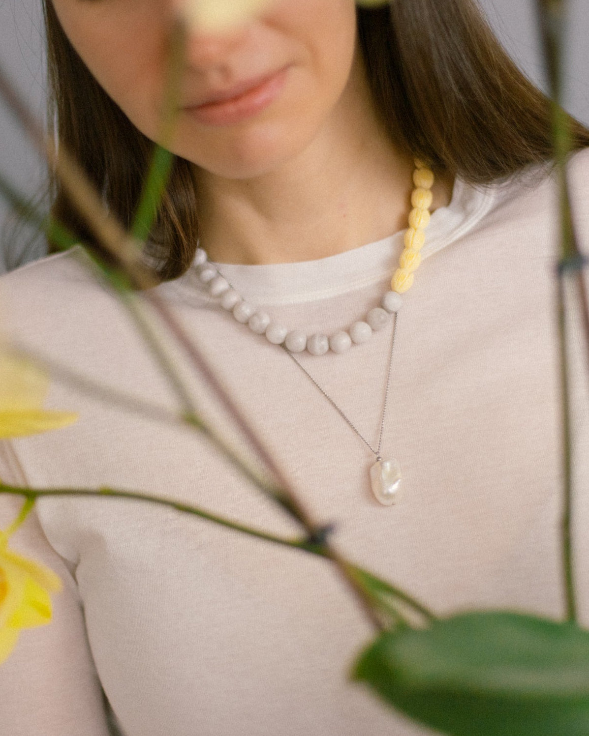 Soft Bloom Necklace in lace white agate and yellow acrylic beads styled with baroque pearl pendant, delicate layered choker for fresh everyday elegance.