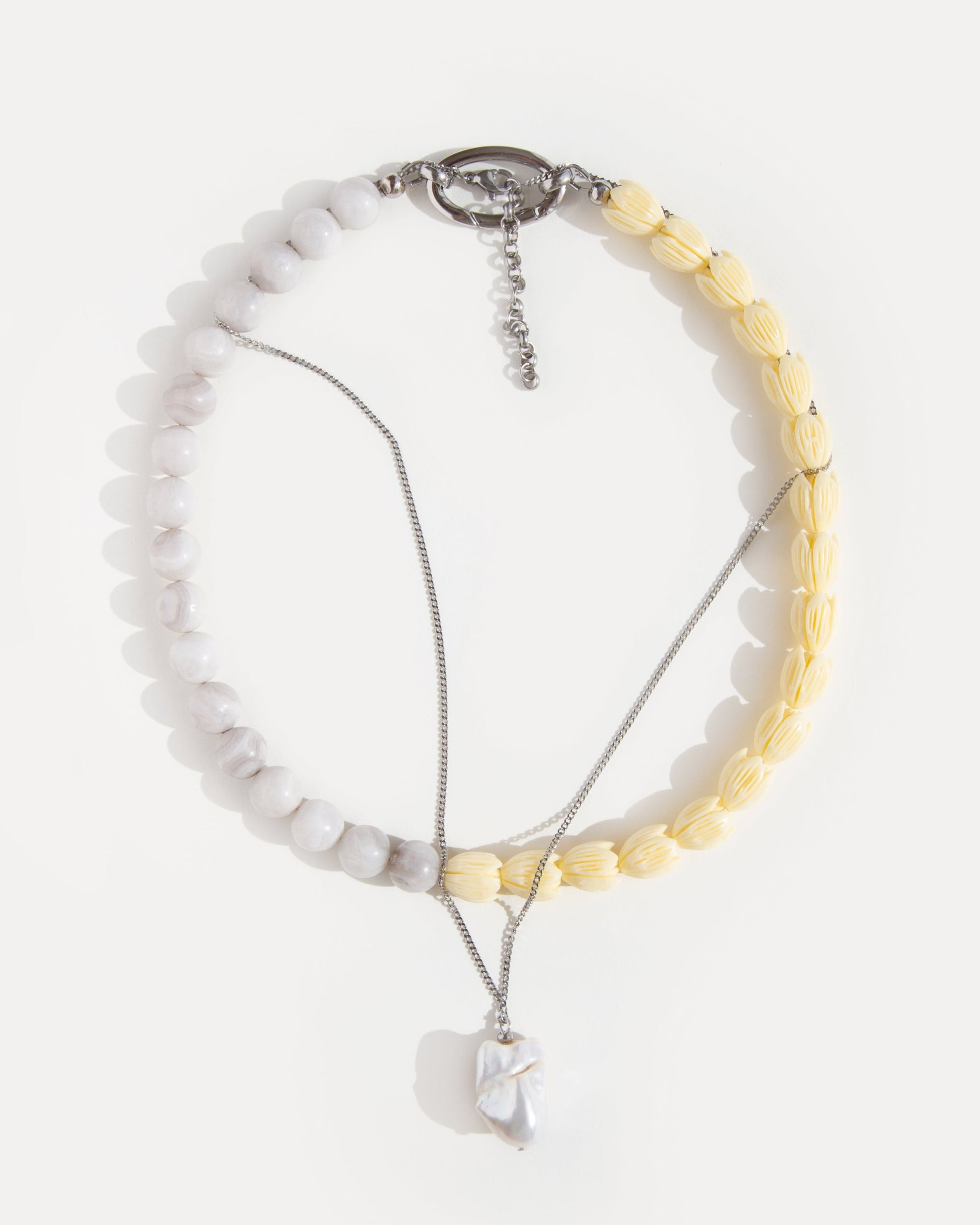Soft Bloom Necklace of lace agate and yellow acrylic beads shown with baroque pearl pendant, versatile minimalist necklace for layering.
