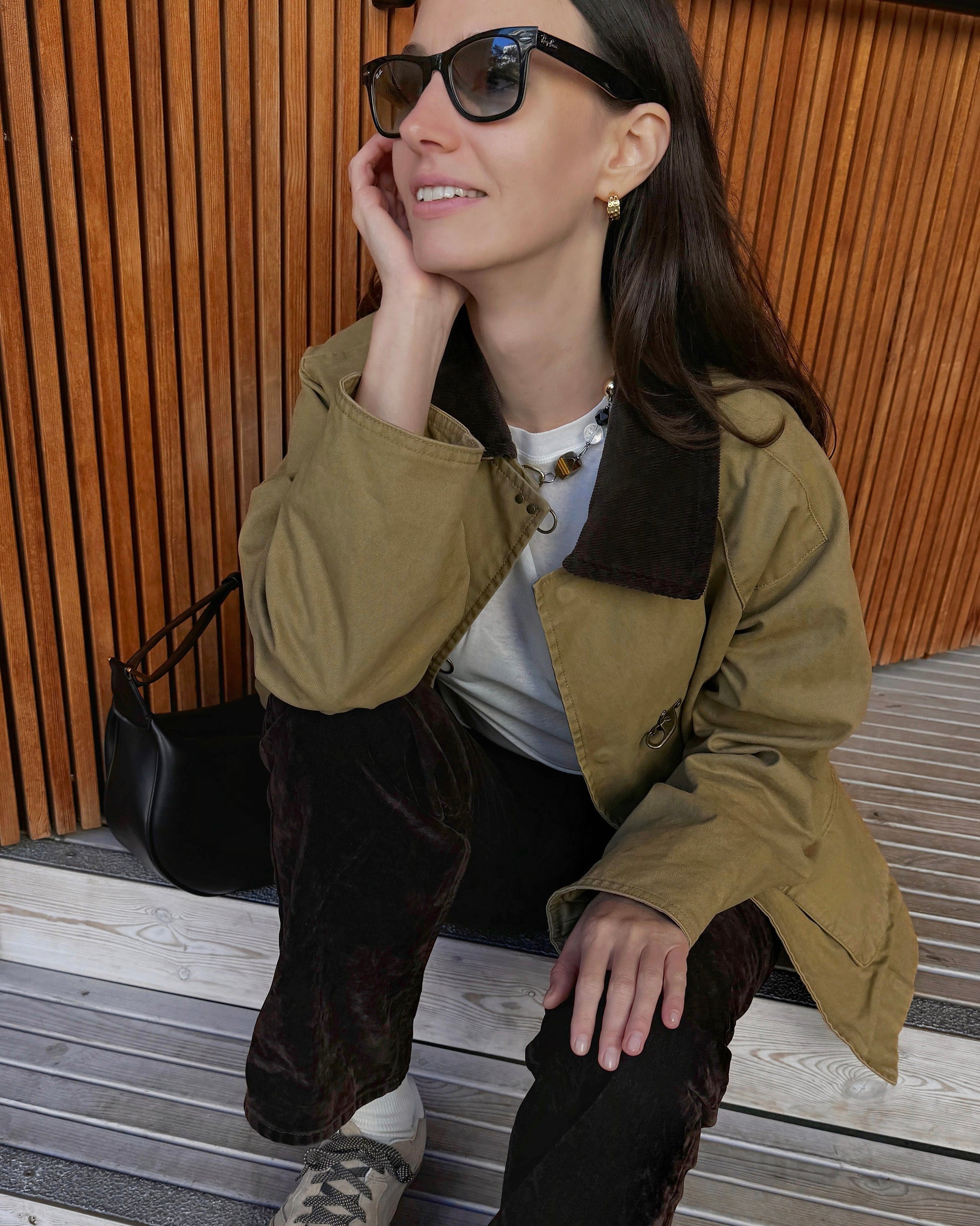 Tiger Eye Necklace styled with beige jacket and velvet trousers in a modern streetwear look, featuring tiger eye, agate, quartz, and mixed metal accents