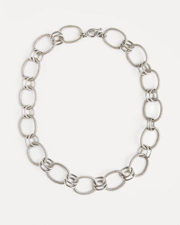 The Venus Necklace in polished stainless steel with sculptural twisted links — a timeless statement chain that feels modern and refined.